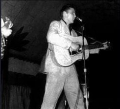 1955 Aug 8_Elvis on stage.jpg